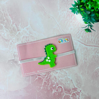 Roaring Love: Handmade Felt Green Baby Dino Rakhi – A Playful Bond of Sibling Joy